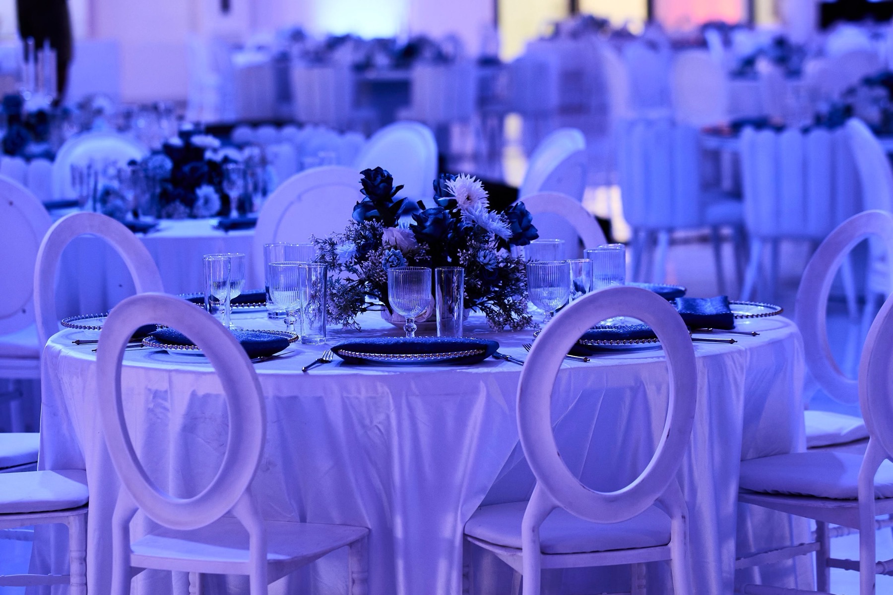A dressed banquet table set for guests