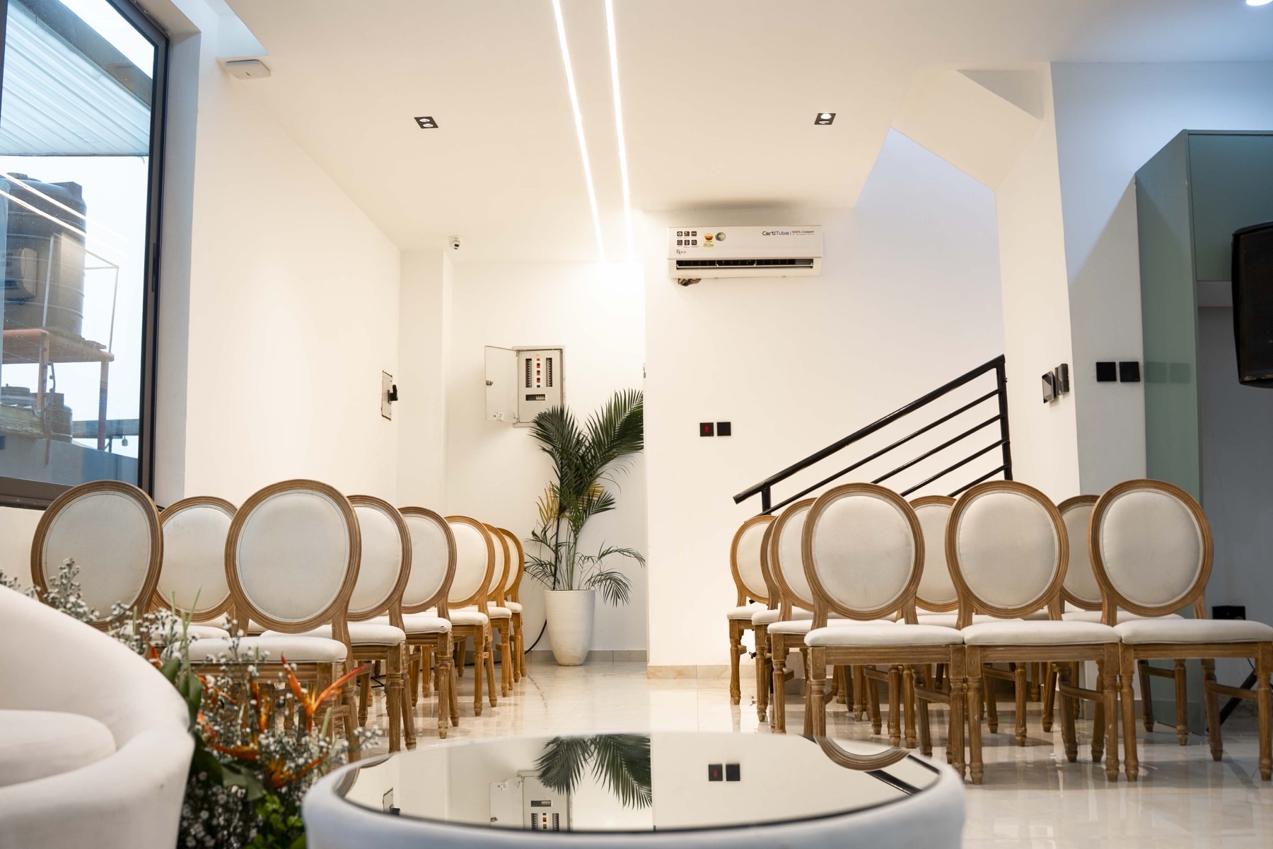 Ceremony seating laid out in the indoor space